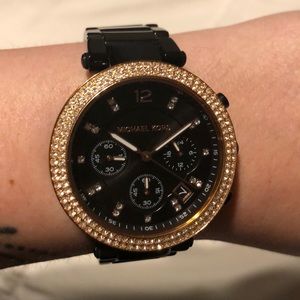 Black and gold MICHAEL KORS watch